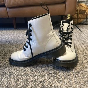 White Dr. Martens with black laces